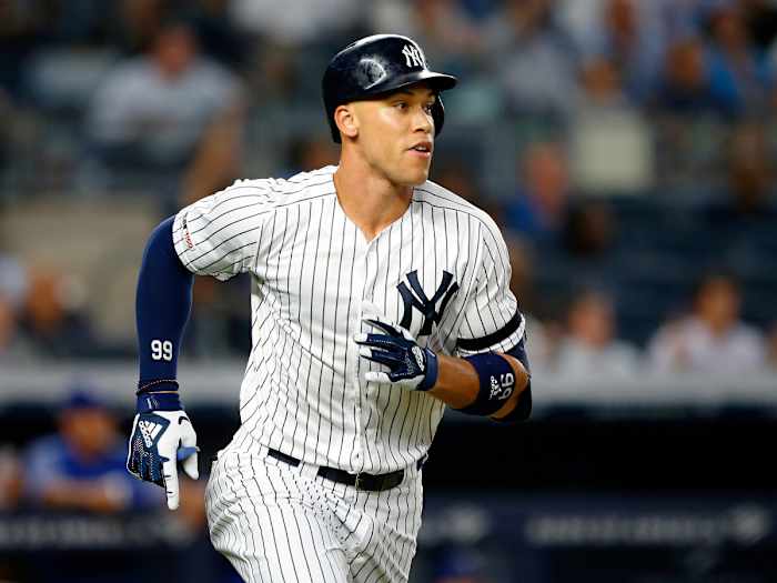 Sep 4, 2019; Bronx, NY, USA; New York Yankees right fielder Aaron Judge (99) rounds the bases after hitting a home run in the third inning against the Texas Rangers at Yankee Stadium.